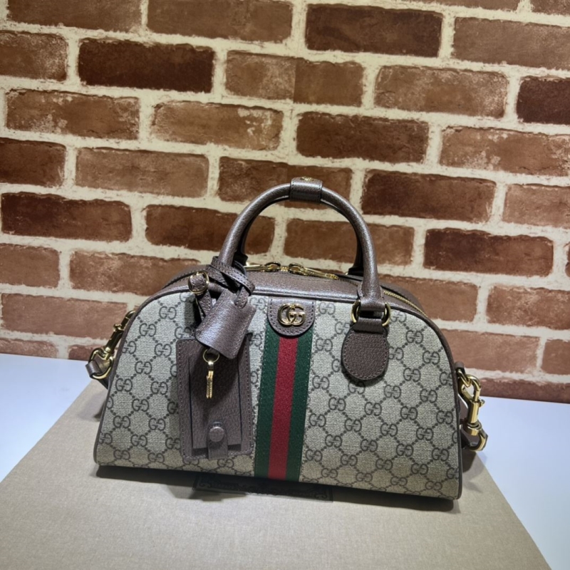 G*u*i top handle bags